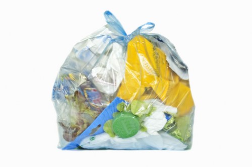 Waste collection truck at a depot